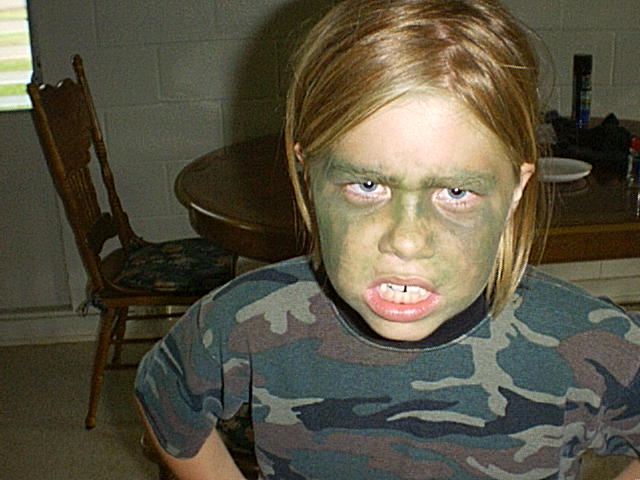 Kristen with camo face paint on